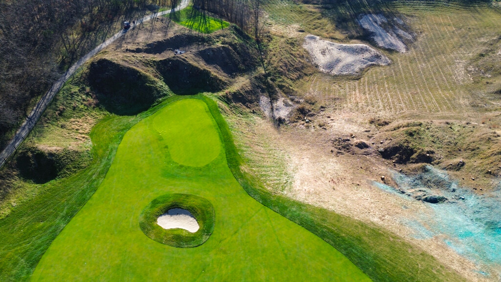 Hole 14 fully rebuilt sodded green and removal of buckthorn and more. Aerial view to show changes. Used as sneak peak on post for course updates.